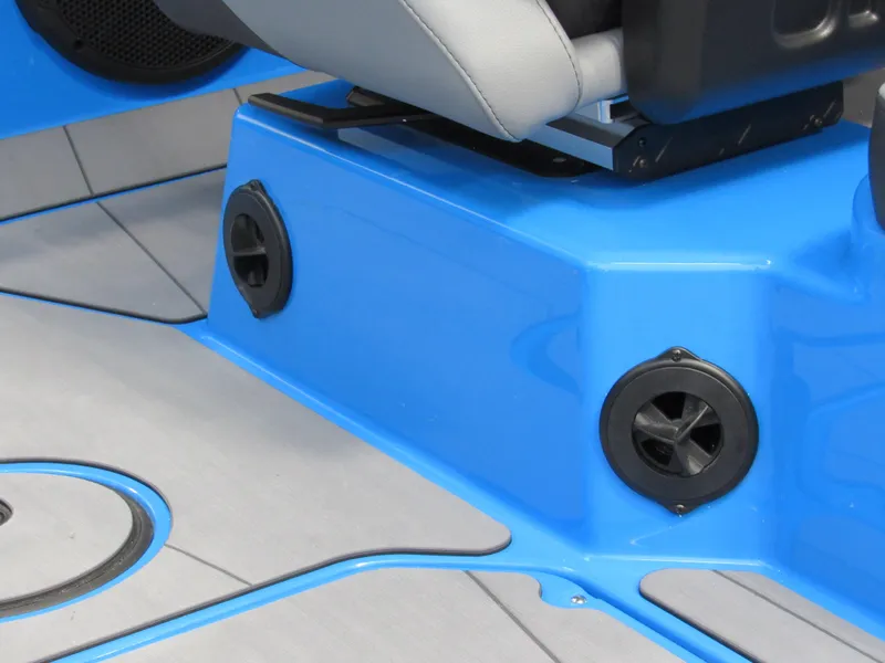 Slide: The Image of Blue interior of 2025 Axis A225 boat with speakers and seating. - 16