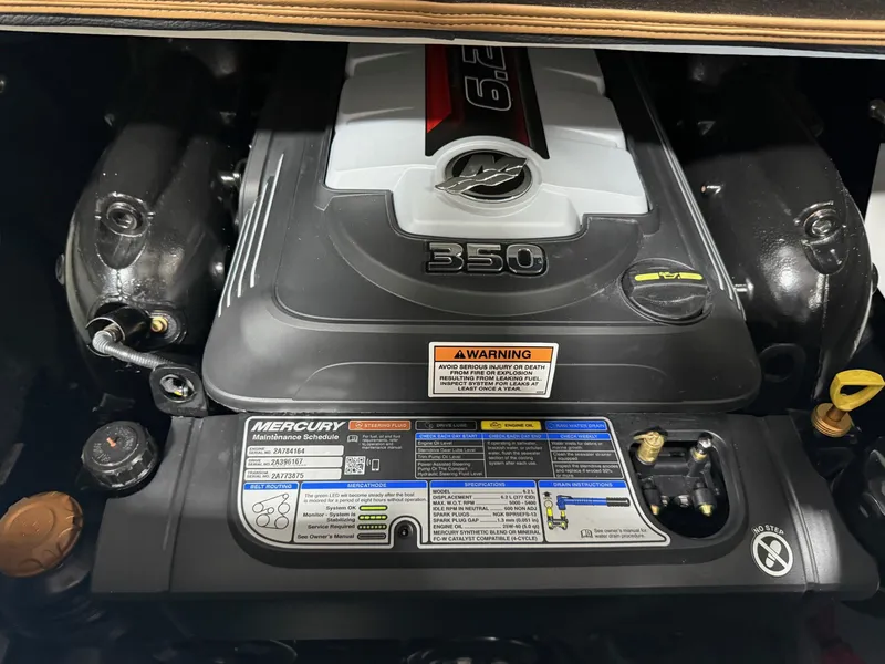 Slide: The Image of 2024 Crownline Eclipse E235 engine, featuring Mercury 350 horsepower specifications. - 10