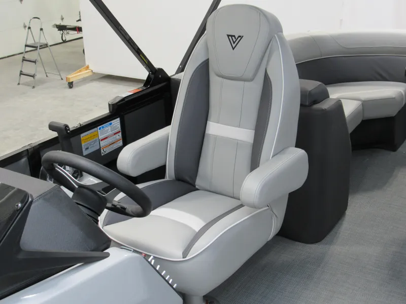 Slide: The Image of 2025 Viaggio Lago X22U boat interior with sleek captain's chair and modern design. - 11