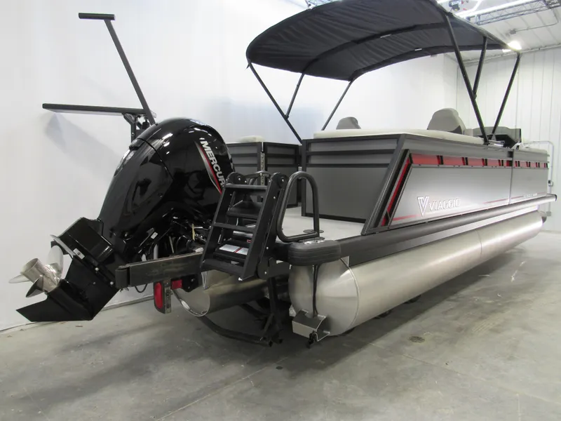 Slide: The Image of 2025 Viaggio Lago X22U pontoon boat with Mercury outboard motor and canopy. - 2