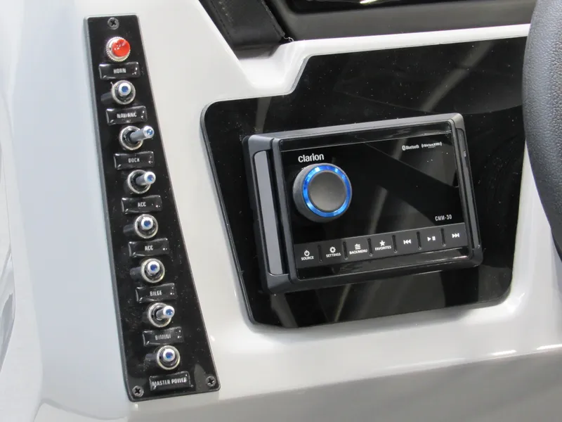 Slide: The Image of Control panel of 2025 Viaggio Lago X22U with Clarion audio system and switches. - 5