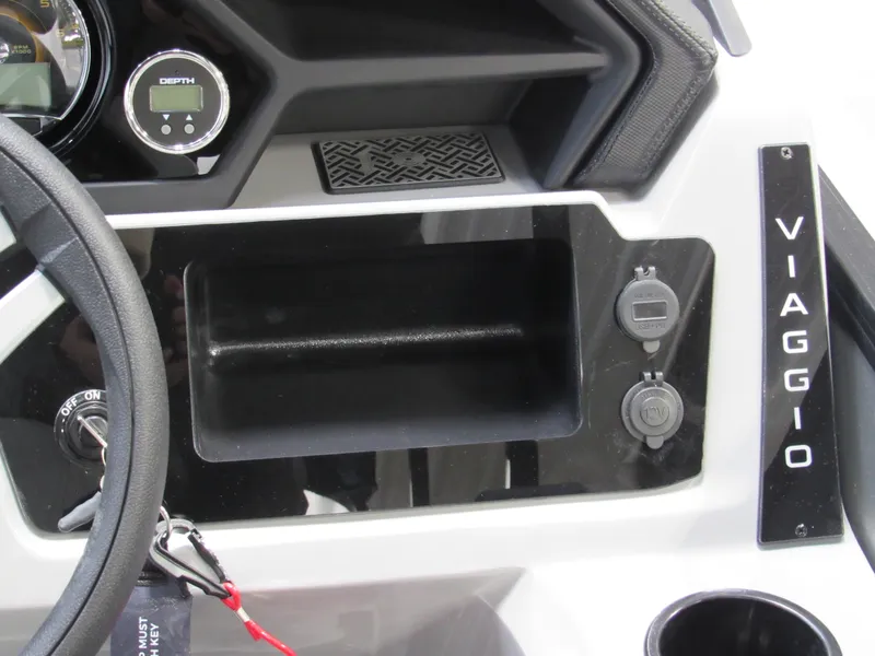 Slide: The Image of Dashboard of 2025 Viaggio Lago X22U boat with controls and branding. - 6