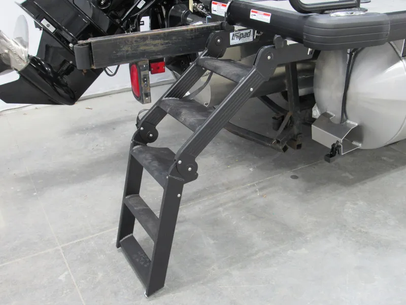 Slide: The Image of Foldable boat ladder on a 2025 Viaggio Lago X22U pontoon. - 7