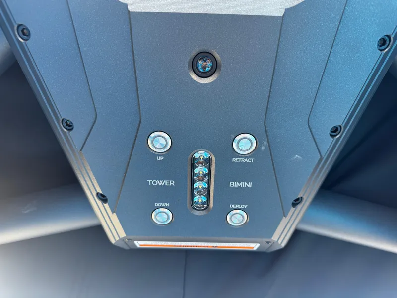 Slide: The Image of Control panel of 2025 Supra SE 550 boat with tower and bimini buttons. - 40