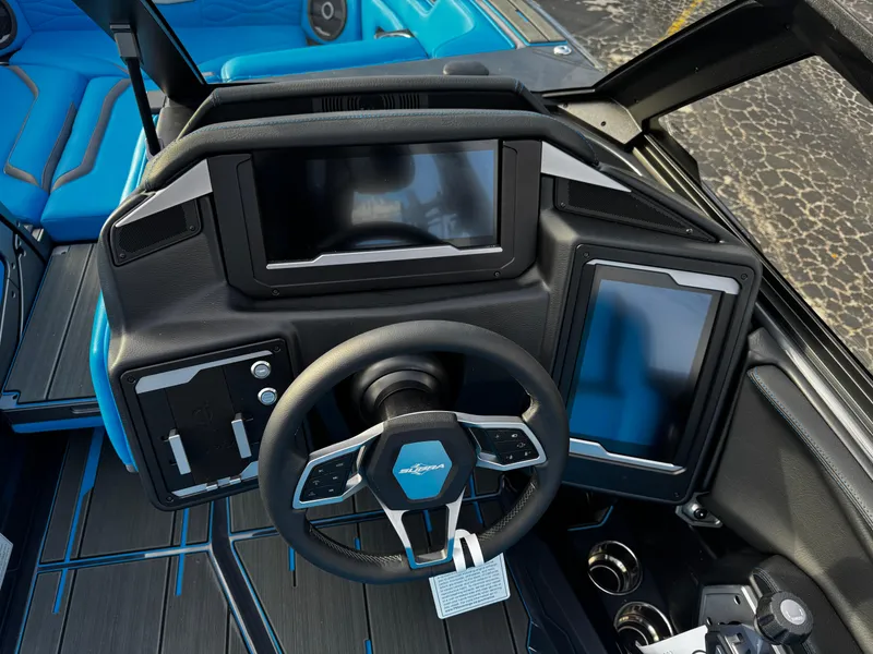 Slide: The Image of 2025 Supra SE 550 boat dashboard with modern controls and digital displays. - 46