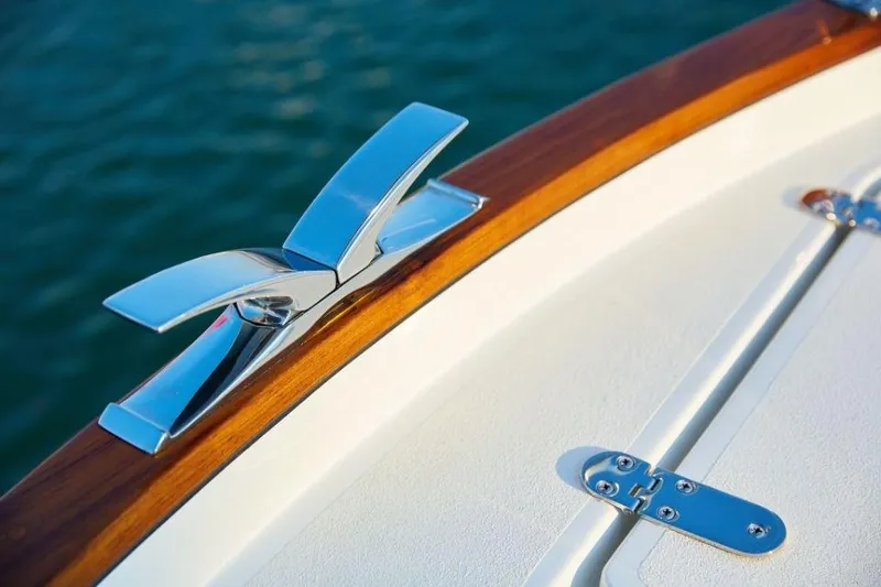 Slide: The Image of Close-up of a 2025 Rustler 41 boat's polished cleat and deck detail. - 11