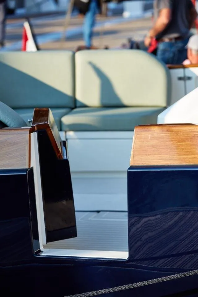 Slide: The Image of 2025 Rustler 41 yacht interior with elegant seating and wooden accents. - 18