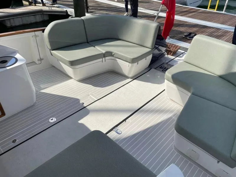 Slide: The Image of Luxurious seating area on 2025 Rustler 41 yacht, featuring modern design and comfortable cushions. - 22