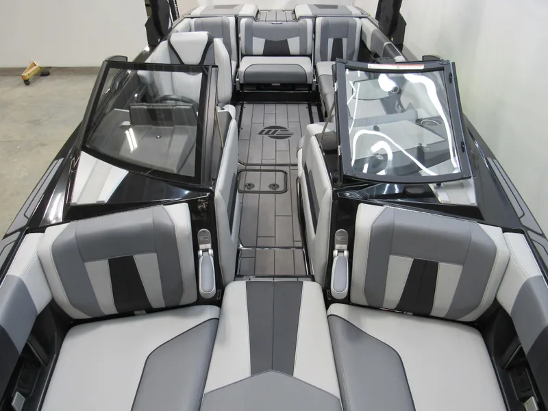 Slide: The Image of 2023 Malibu Wakesetter 23 MXZ interior with sleek, modern seating and stylish design. - 13