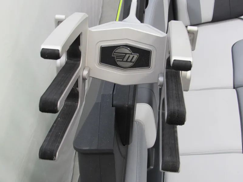 Slide: The Image of 2023 Malibu Wakesetter 23 MXZ boat interior with sleek seating and armrest design. - 17