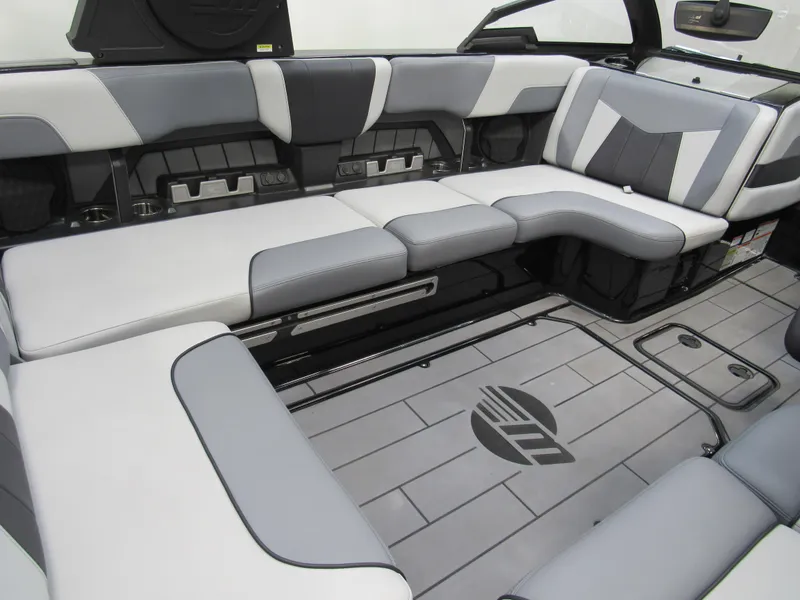 Slide: The Image of 2023 Malibu Wakesetter 23 MXZ interior with sleek gray and white seating. - 8