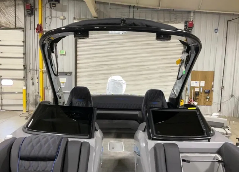 Slide: The Image of 2024 Bennington RX Sport Line boat interior with sleek seating and modern design. - 6