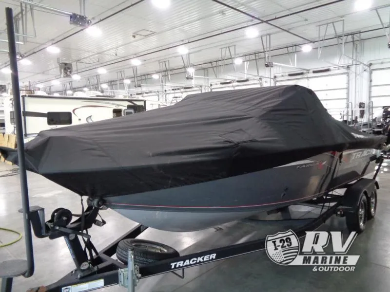 Slide: The Image of 2018 Targa V-18 WT boat covered in a garage, on a Tracker trailer. - 11