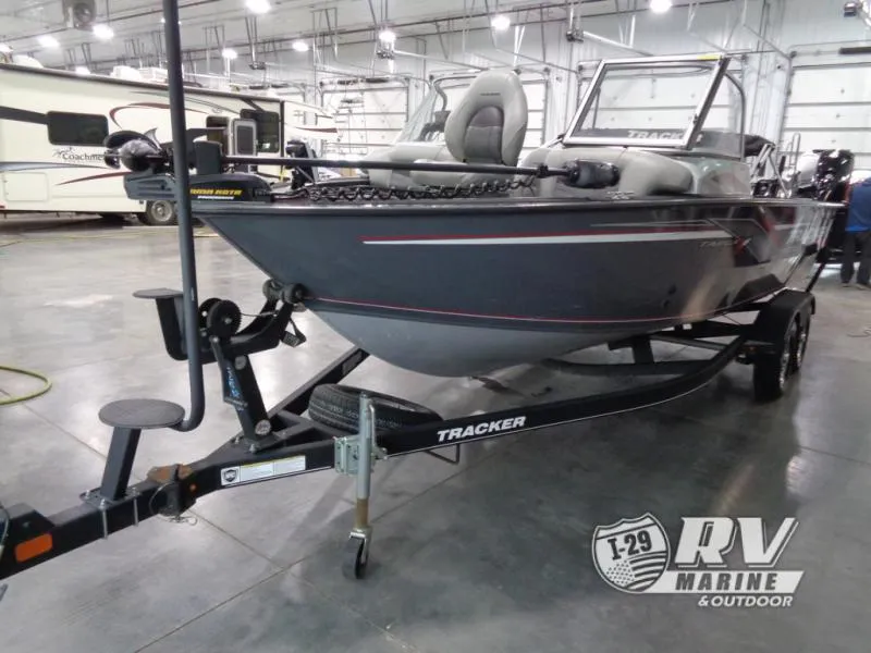 Slide: The Image of 2018 Targa V-18 WT boat on trailer in indoor showroom. - 13