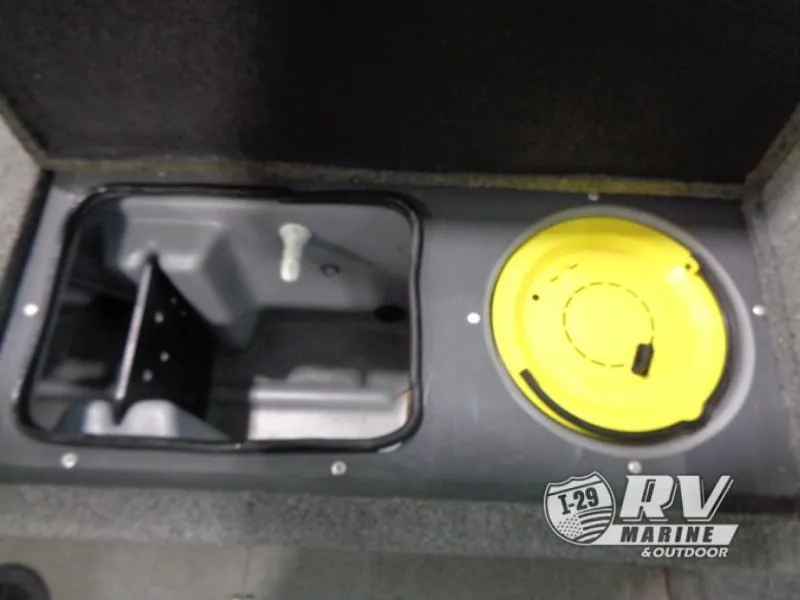 Slide: The Image of 2018 Targa V-18 WT boat storage compartment with yellow lid, RV Marine logo visible. - 17