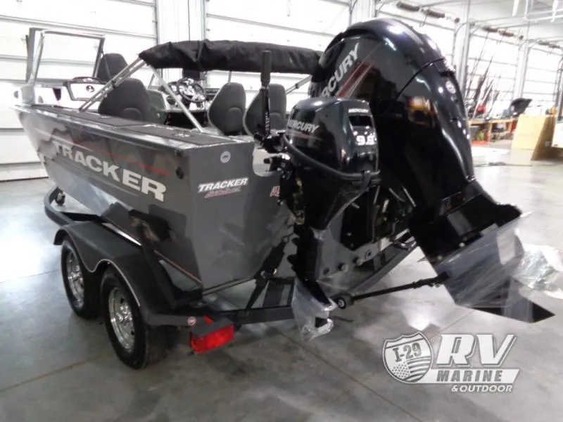 Slide: The Image of 2018 Targa V-18 WT boat with Mercury outboard motor in a showroom. - 25