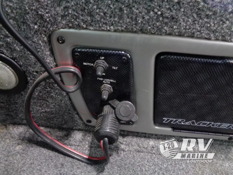 Slide: The Image of Control panel of 2018 Targa V-18 WT boat with wiring and Tracker branding. - 35