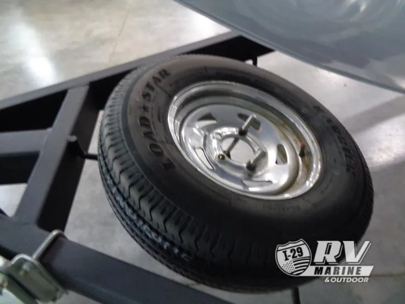 Slide: The Image of Targa V-18 WT 2018 trailer tire on metal frame, Loadstar branding visible. - 38