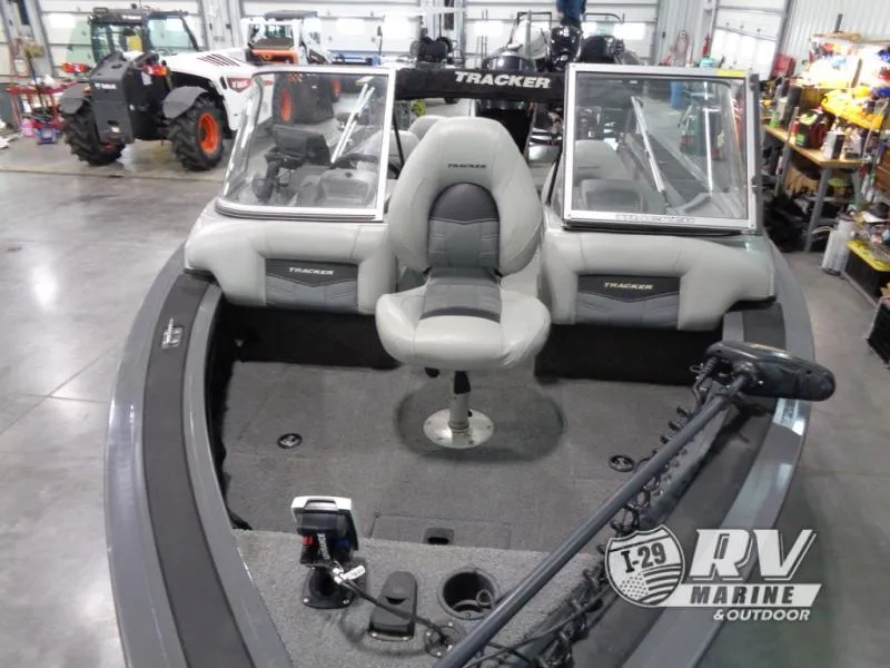 Slide: The Image of 2018 Targa V-18 WT boat interior with seating and equipment in a showroom. - 4