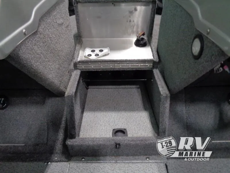 Slide: The Image of 2018 Targa V-18 WT boat interior with storage compartments and control panel. - 8