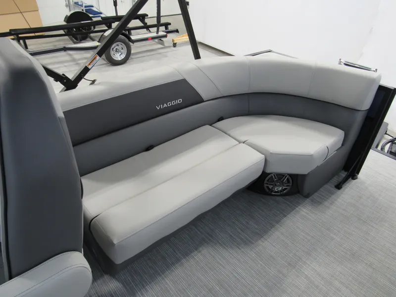 Slide: The Image of 2025 Viaggio Lago V20U boat interior with gray seating and modern design. - 7