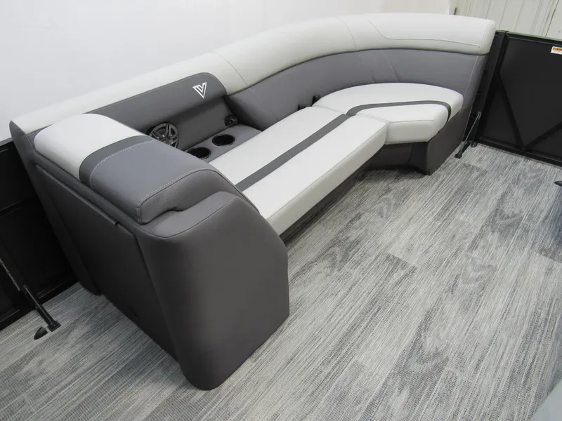 Slide: The Image of 2025 Viaggio Lago X22C luxury boat seating with gray upholstery and cup holders. - 8