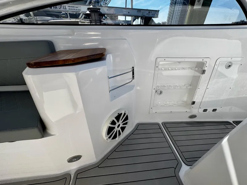 Slide: The Image of 2024 NX Boats 280 Xtreme interior with sleek seating and modern design elements. - 18