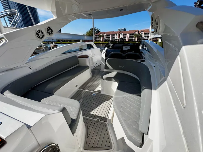 Slide: The Image of 2024 NX Boats 280 Xtreme interior with sleek seating and modern design. - 6