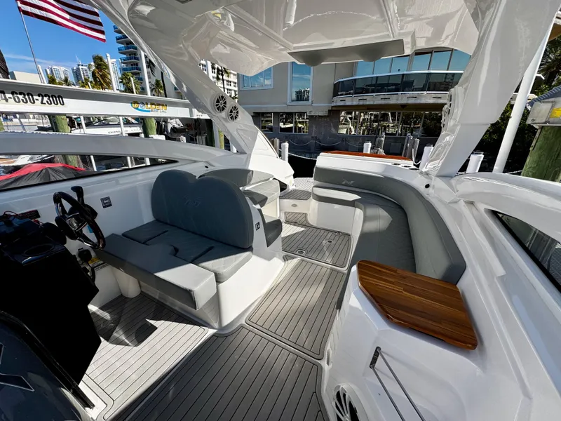 Slide: The Image of 2024 NX Boats 280 Xtreme interior with seating and modern design. - 7