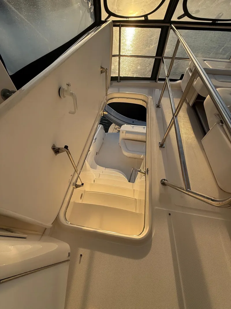 Slide: The Image of Interior view of 2001 Sea Ray 540 Cockpit Motor Yacht staircase. - 12