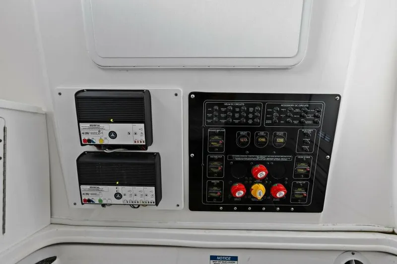 Slide: The Image of Control panel of 2024 Sea Fox 328 Commander boat with switches and indicators. - 28