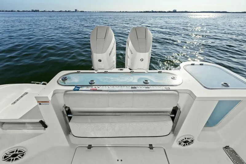 Slide: The Image of 2024 Sea Fox 328 Commander boat with dual engines on open water. - 5