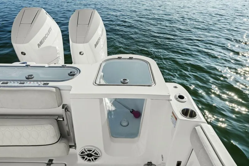 Slide: The Image of 2024 Sea Fox 328 Commander boat with dual Mercury engines on open water. - 6