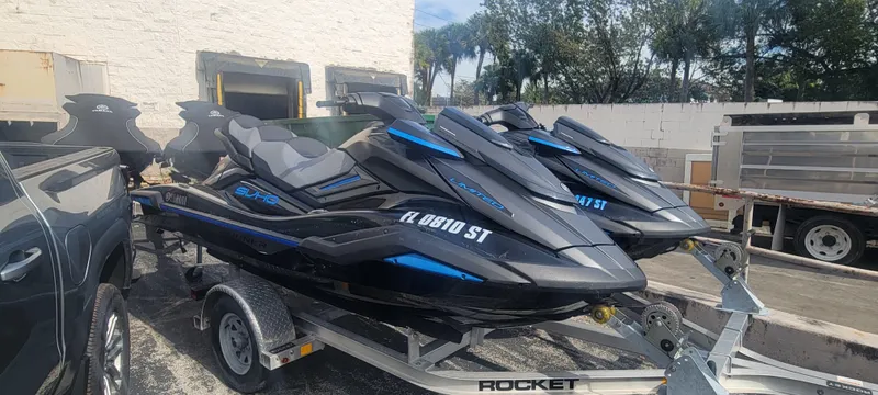 The Image of 2020 Yamaha WaveRunner FX Cruiser SVHO jet skis on a trailer, ready for transport. - 1