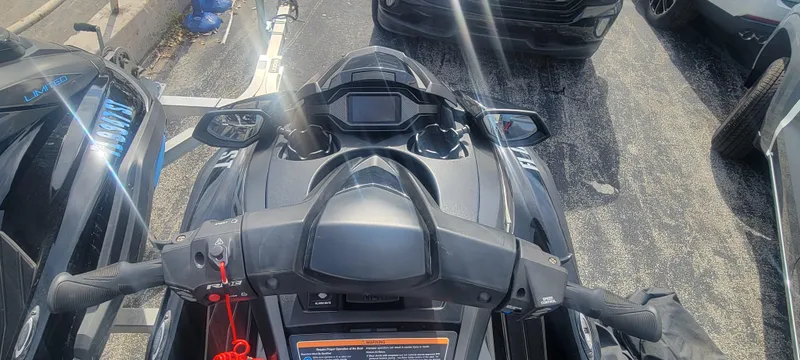 Slide: The Image of 2020 Yamaha WaveRunner FX Cruiser SVHO, top view, parked on asphalt with surrounding vehicles. - 6