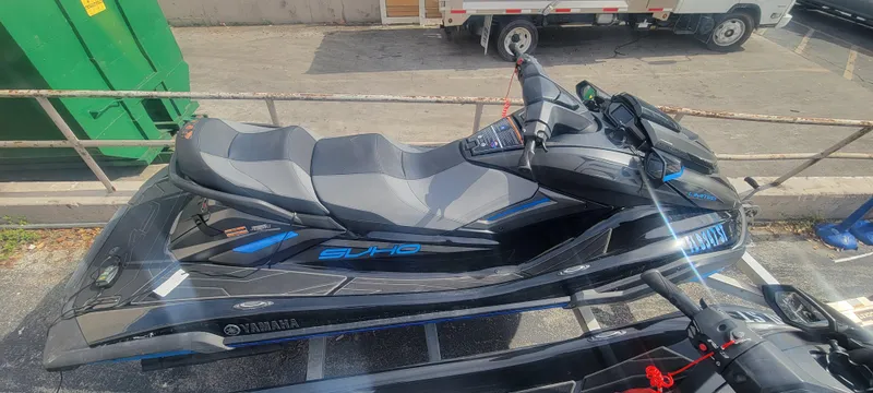 Slide: The Image of 2020 Yamaha WaveRunner FX Cruiser SVHO jet ski in a parking area. - 8