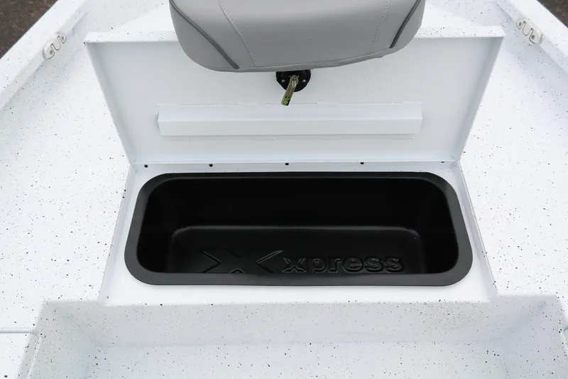 Slide: The Image of 2025 Xpress H20B boat storage compartment with seat, featuring durable design and ample space. - 13