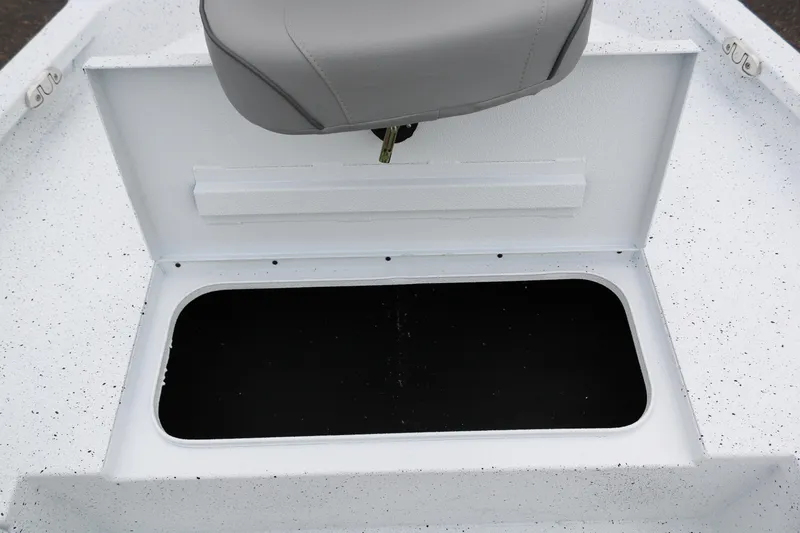 Slide: The Image of 2025 Xpress H20B boat storage compartment with seat, open lid. - 14