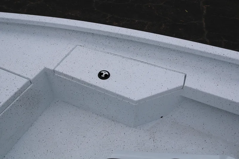 Slide: The Image of 2025 Xpress H20B boat interior with storage compartment. - 15