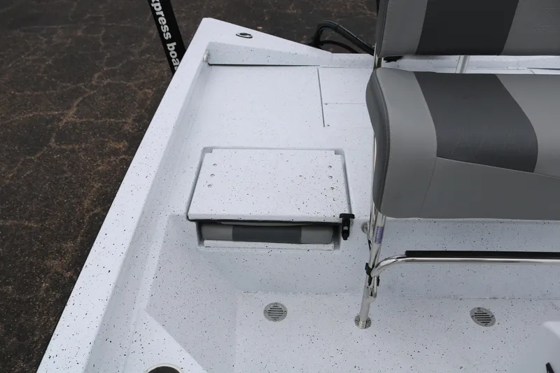 Slide: The Image of 2025 Xpress H20B boat interior with seating and storage compartment. - 25
