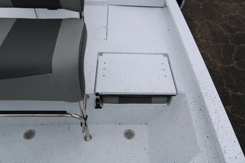 Slide: The Image of 2025 Xpress H20B boat interior with seating and storage compartment. - 28