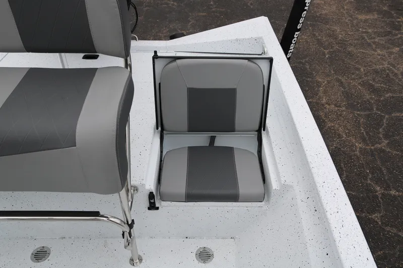 Slide: The Image of 2025 Xpress H20B boat seat with gray and black upholstery. - 29
