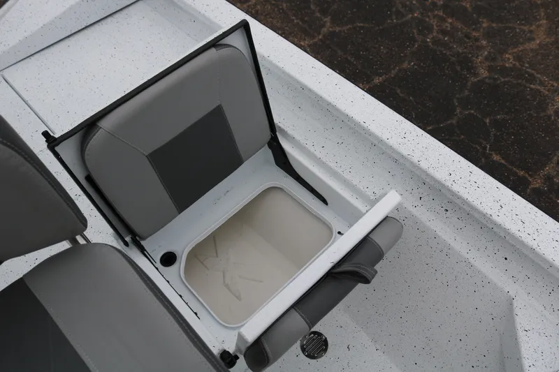 Slide: The Image of 2025 Xpress H20B boat seat with storage compartment open. - 30