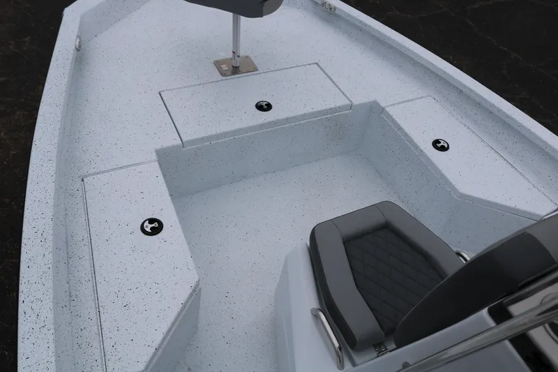 Slide: The Image of 2025 Xpress H20B boat interior with seating and storage compartments. - 9
