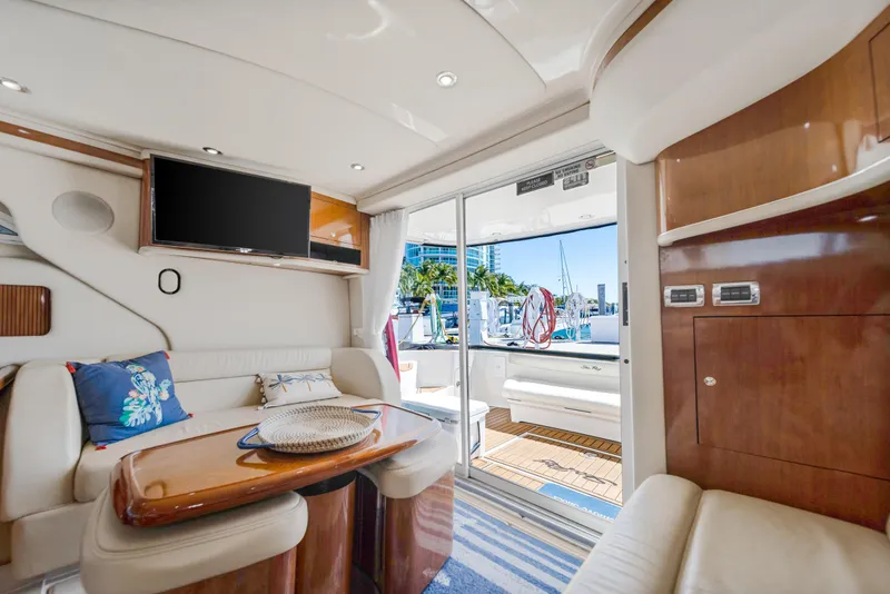 Slide: The Image of Luxurious interior of 2003 Sea Ray 400 Sedan Bridge yacht with modern amenities. - 14