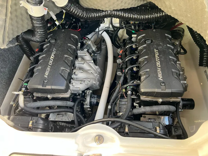 Slide: The Image of 2020 Yamaha Boats 242 Limited SE engine compartment with dual high-output engines. - 11