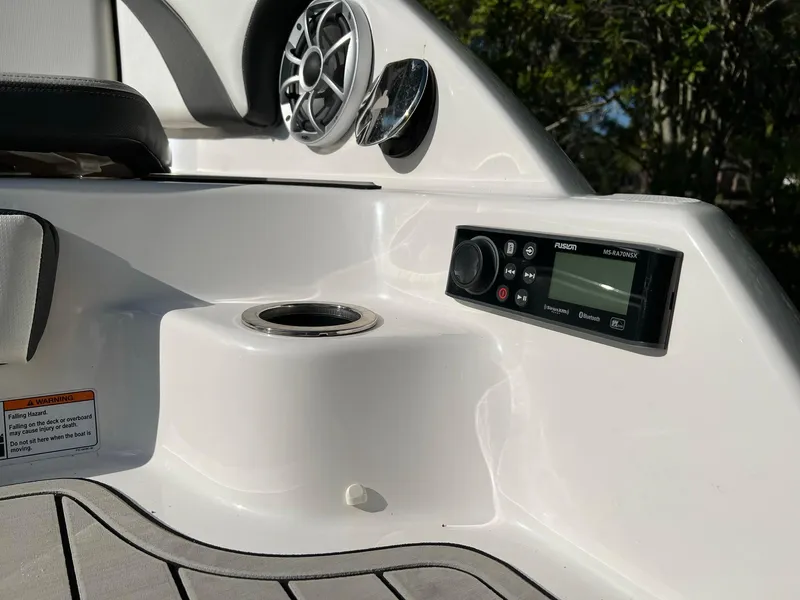 Slide: The Image of 2020 Yamaha Boats 242 Limited SE dashboard with speaker and control panel. - 4