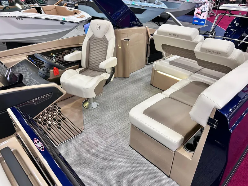 Slide: The Image of 2025 Harris Crowne SL 250 boat interior with luxurious seating and modern design. - 1