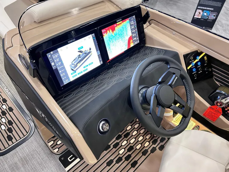 Slide: The Image of 2025 Harris Crowne SL 250 dashboard with advanced navigation and control systems. - 5