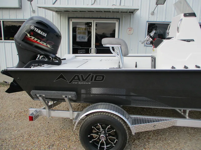 Slide: The Image of 2025 Avid 20 ROGUE CC boat with Yamaha engine on trailer. - 3